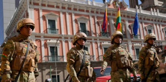 Soldiers stand guard outside the presidential palace in Plaza Murillo in La Paz, Bolivia. (AP Photo/Juan Karita)COPYRIGHT 2024 THE ASSOCIATED PRESS. ALL RIGHTS RESERVED