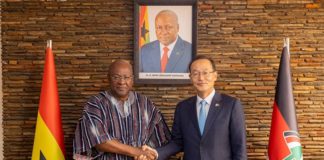 Former President John Dramani Mahama (left) in a handshake with the Ambassador of South Korea, Park Kyongsig