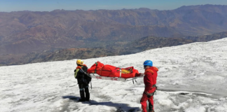 Police carry a body identified as US mountain climber Bill Stampfl, on Mount Huascaran in Huaraz, Peru, on July 5, 2024. Peruvian National Police/AP