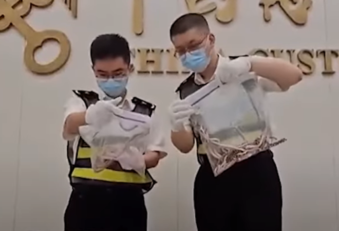 Man in China caught smuggling 100 live snakes in his trousers