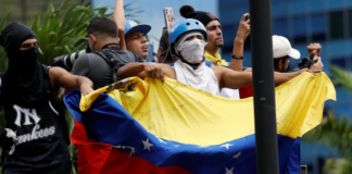 Reuters Venezuelans have been gathering in central Caracas for a second day