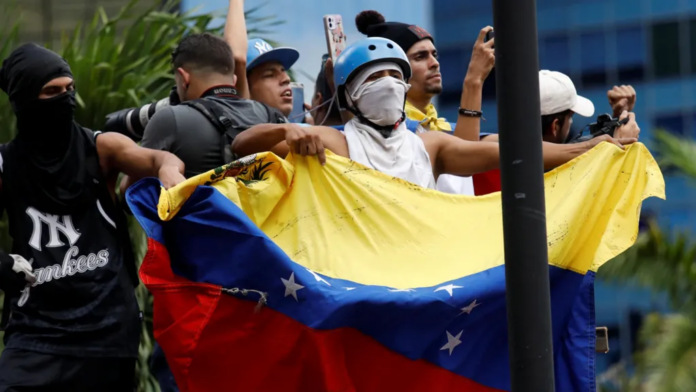 Reuters Venezuelans have been gathering in central Caracas for a second day