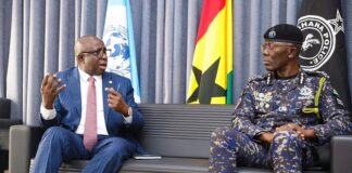 Inspector-General of Police Dr. George Akuffo Dampare (right) having an interaction with Assistant Inspector-General of Police (Rtd) Garba Baba Umar