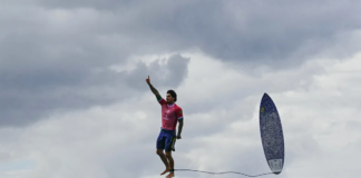 Brazil's Gabriel Medina reacts after getting a large wave in the 5th heat of the men's surfing round three in Teahupo'o during the Paris 2024 Olympic Games (Credit: Getty Images)