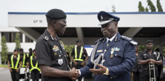 Mr. William Fayia Sellu, IGP of Police of Sierra Leone in a chat with Dr. George Akuffo Dampare, IGP of Ghana.