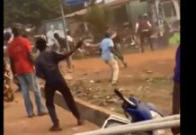 Some members of NPP and NDC pelting stones at each other