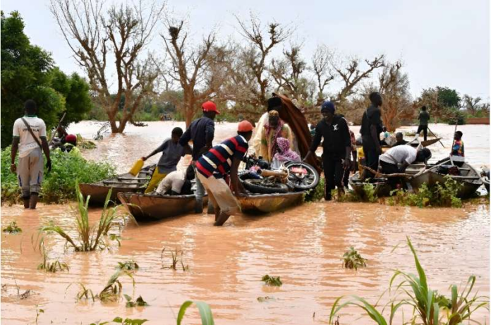 In Niger, people were forced to use canoes after heavy rains damaged main roads.