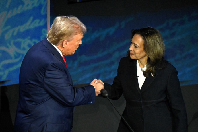 Former President Donald Trump shakes hands with Vice President Kamala Harris at the start of the ABC presidential debate in Philadelphia on Tuesday. Saul Loeb/AFP/Getty Images