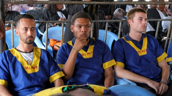 REUTERS (L-R) Benjamin Zalman-Polun, Marcel Malanga and Tyler Thompson are the three US citizens sentenced to death for the coup attempt