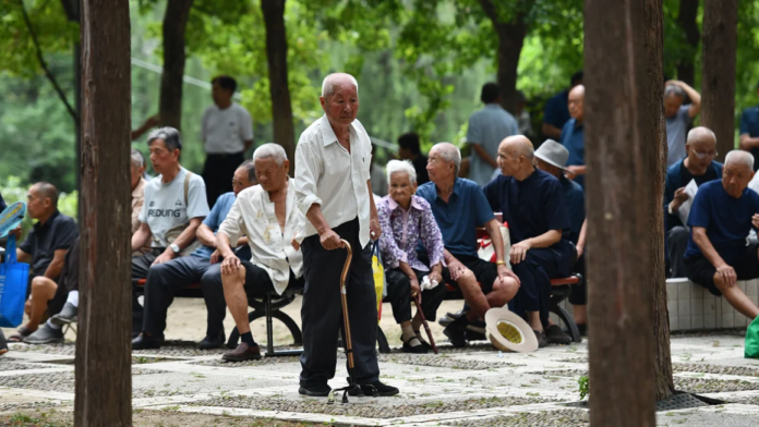 Senior citizens relax at a park in Fuyang city in eastern China's Anhui province earlier this month. CFOTO/Future Publishing/Getty Images