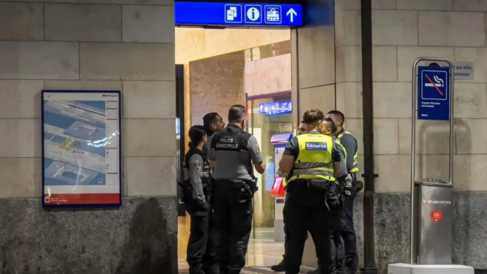 ELODIE LE MAOU/AFP The suspected killer was arrested by police at Geneva train station