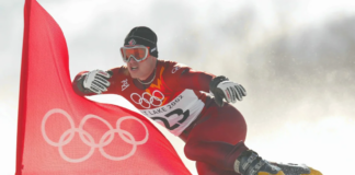 Ryan Wedding of Canada competes in the qualifying round of the men's parallel giant slalom snowboarding event during the Salt Lake City Winter Olympic Games at the Park City Mountain Resort in Park City, Utah.  Adam Pretty/Getty Images