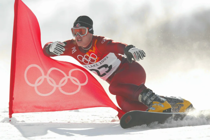 Ryan Wedding of Canada competes in the qualifying round of the men's parallel giant slalom snowboarding event during the Salt Lake City Winter Olympic Games at the Park City Mountain Resort in Park City, Utah.  Adam Pretty/Getty Images