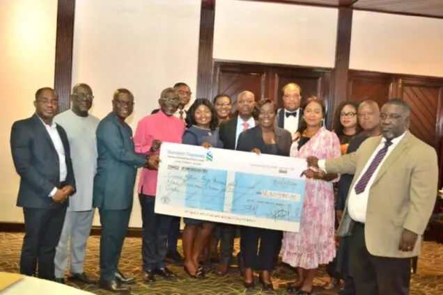 Labadi Beach Hotel Presenting Dividend Cheque to the Shareholder. From L-R Mr. Alfred Opoku Agyepong-Financial Controller, Labadi Beach Hotel, Mr. Addae Antwi-Boasiako, Board Member, Mr David Eduaful-Managing Director-Labadi Beach Hotel, Professor Douglas Boateng-Board Chair, Mr. Emmanuel Animley-Deputy Financial Controller-Labadi Beach Hotel, Mrs. Yvonne Prempeh-SSNIT, Ms. Trudy Lamptey-Company Secretary, Mr. Sampson Addo-SSNIT, Mrs. Juliana Addo-Yobo-Board Member, Mr. Kenneth Agyare-SSNIT, Mrs. Rosemary Yeboah-Board Member, Ms. Juliana Kpedekpo-Board Member, Mr Abdul Rahim Ahmed-Board Member, Mr. Joseph Appau Boateng-SSNIT.