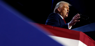 Republican presidential nominee, former President Donald Trump speaks during an election night event at the Palm Beach Convention Center in West Palm Beach, Florida, on November 06, 2024. Chip Somodevilla/Getty Images