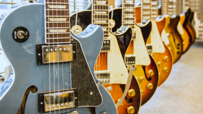 Gibson guitars | photo by Geoff Alexander via Wikimedia Commons