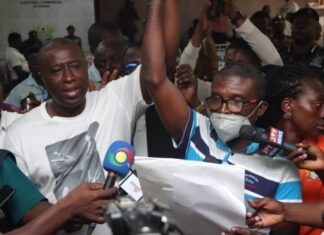 Patrick Yaw Boamah (left), being declared winner of the Okaikwei Central Constituency Parliamentary election. Picture: ELVIS NII NOI DOWUONA