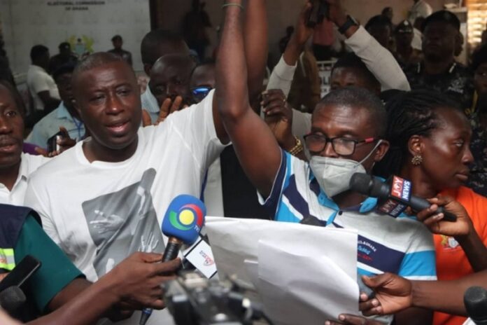 Patrick Yaw Boamah (left), being declared winner of the Okaikwei Central Constituency Parliamentary election. Picture: ELVIS NII NOI DOWUONA