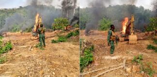 The excavators being burnt after the raid on illegal miners